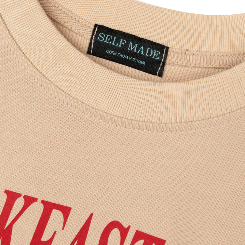 CHAMPIONS  TEE  IN  BEIGE